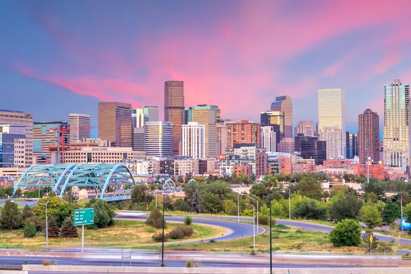 Denver skyline at sunset representing Colorado businesses