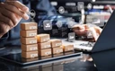 Graphic depicting visual use of ecommerce software to track sales tax.